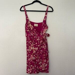 Sézane floral printed wrap dress with ruffle hem.